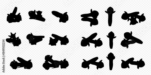 Collection of black silhouettes of cloves, aromatic spice used in cooking and traditional medicine.