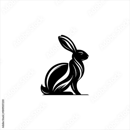 Rabbit silhouette displayed as a clean black vector emblem design. Animal icon concept