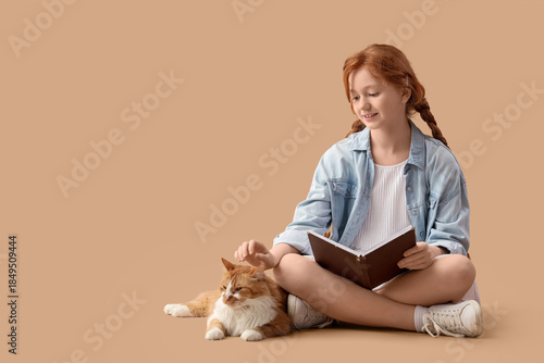 Redhead teenage girl with b...
