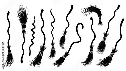 Collection of different types of silhouette black brooms for halloween decoration