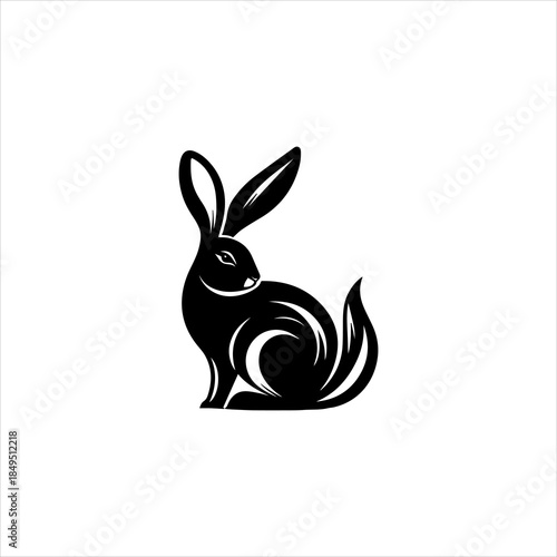 Rabbit silhouette displayed as a clean black vector emblem design. Animal icon concept