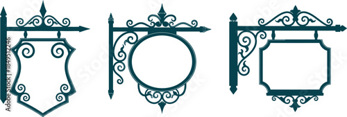 Three ornate metal plaque frames with decorative scrollwork and fleur de lis presented in a row on a plain white background