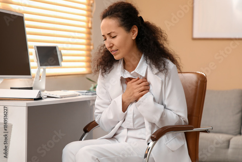 Mature businesswoman having...