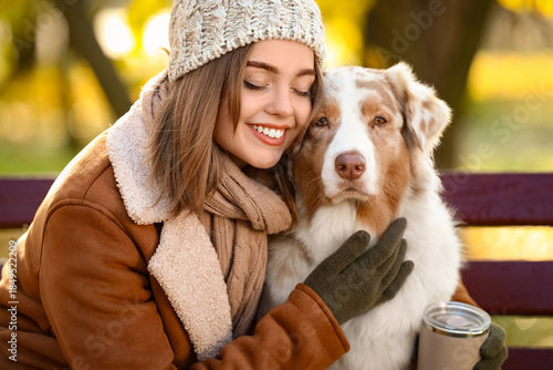 Young woman with coffee cup...