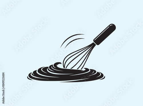 Black Whisk Silhouette Showing Smooth Batter Mixing Motion

