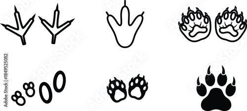animal paws and footprints with flames and spikes