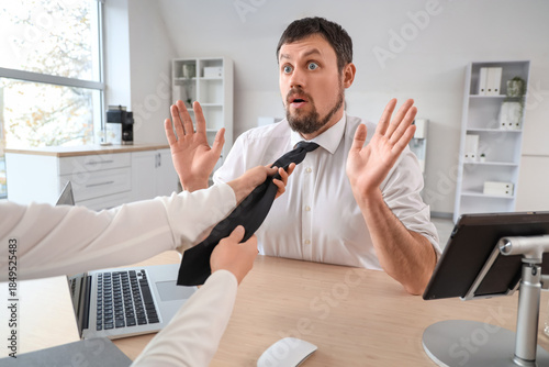 Business woman pulling man'...