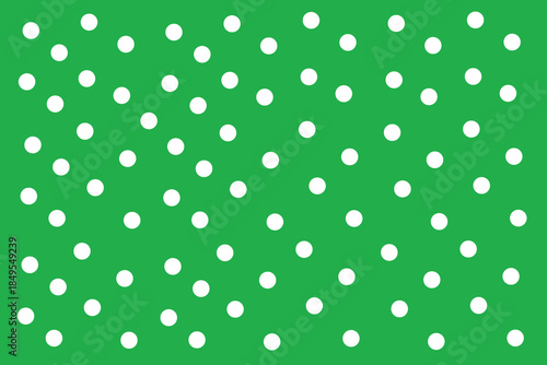 Vibrant Green Background with White Polka Dots for Creative Projects