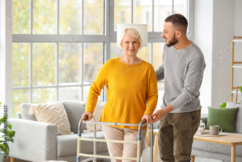 Senior woman with walker an...