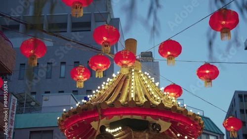 Wallpaper Mural Vibrant Chinese Lanterns and Pagoda-Style Structure in Urban Setting at Dusk Torontodigital.ca