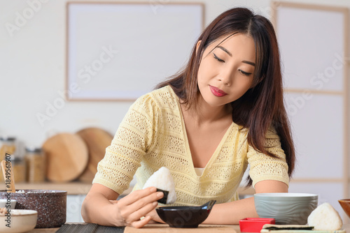 Young Asian woman preparing...