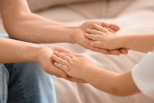 Little girl with her mother...