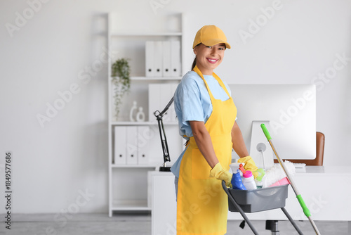 Female janitor with trolley...