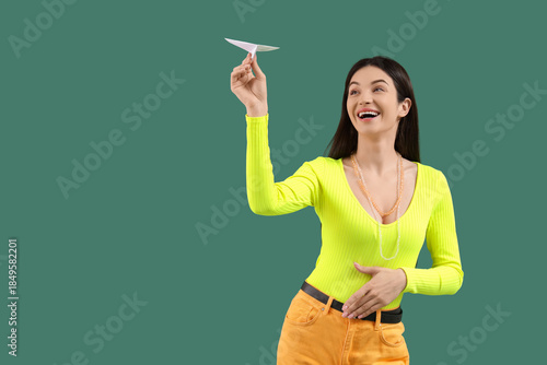 Young woman with paper plan...
