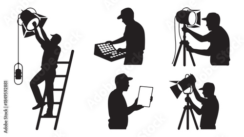 Photographers at work in studio setting with dramatic lighting on white background for advertising