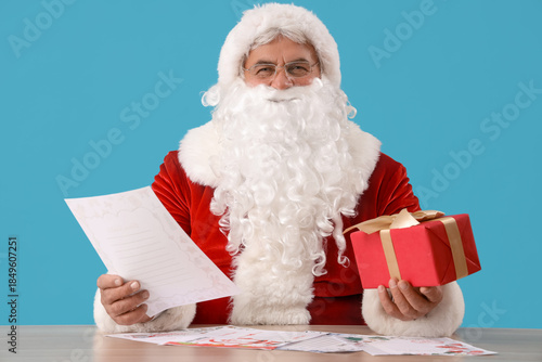 Santa Claus with letter and...