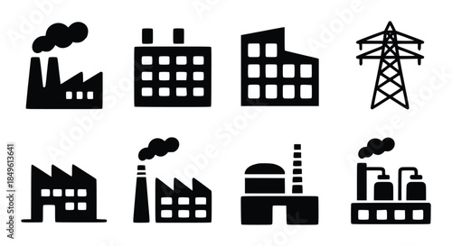 Collection of black industrial factory and power pylon white building