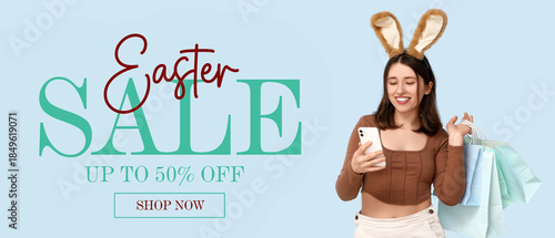 Young woman in bunny ears w...