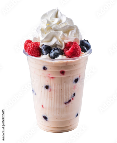 berry smoothie with whipped cream, raspberries and blueberries.