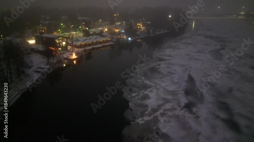 Dark December foggy morning aerial view in Oulu, Finland