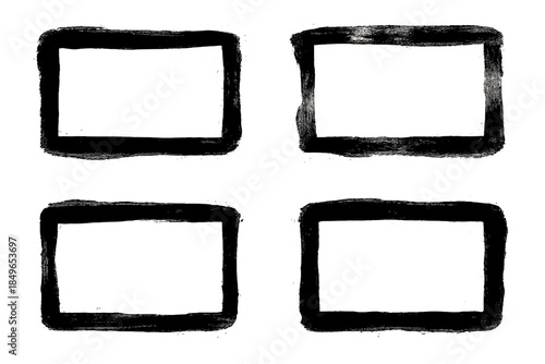 Four grunge frames on dark background