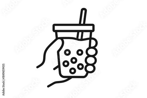 Hand holding a bubble tea drink