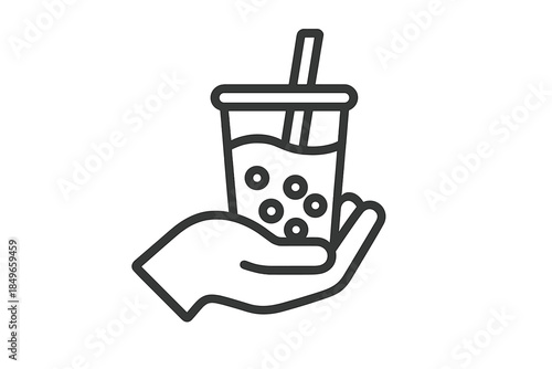Hand holding a bubble tea drink