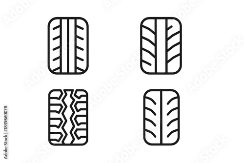 Four tire tread icons on a dark background