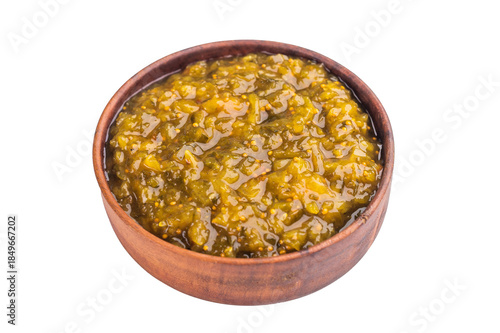 Fotografie Green pickle relish made from cucumbers served in wooden bowl isolated on white