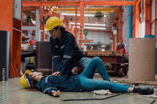 A female officer is checking her friend's pulse after an electrical shock accident.