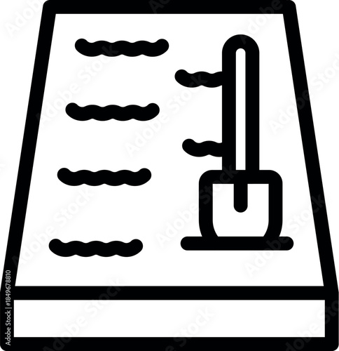 Seed tray with a dibber planting a seedling, essential gardening tools for seed starting