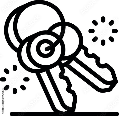 Two keys with key rings are lying on a surface, sparkling and ready to unlock possibilities