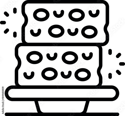 Two sponges are drying on a drainer tray, sparkling clean and ready for use