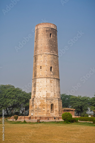 Vertical view of memorial minaret built by mughal emperor Jahangir to his antelope Mansiraj in Hiran Minar complex, Sheikhupura, Punjab, Pakistan