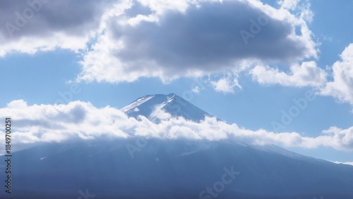 
A picture of Mount Fuji with clouds, making it appear as if it's floating.
