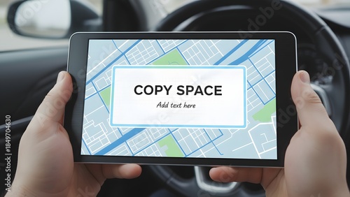 Person holding tablet with map display.