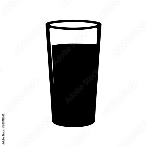 A glass of dark liquid