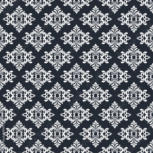 Seamless  black decorative wallpaper pattern.Seamless floral ornament on background.