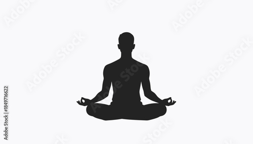 Silhouette of a person meditating in a lotus position, representing peace and mindfulness.