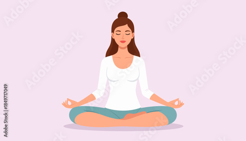Young woman meditating in lotus position, practicing yoga for mental health and relaxation.