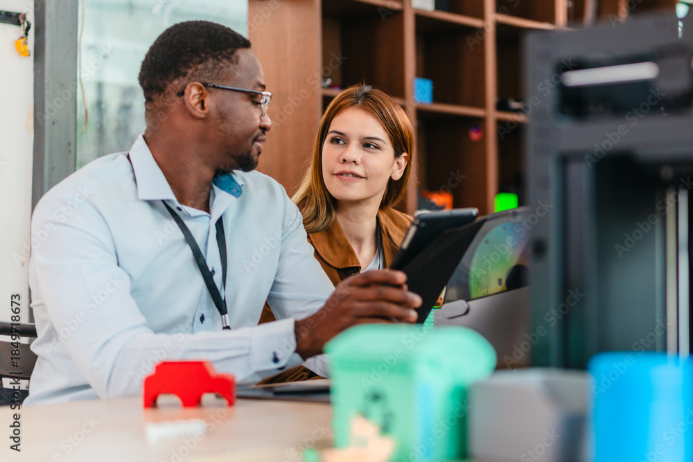 Fototapeta premium Two Product Designers Testing 3D Printed Prototypes