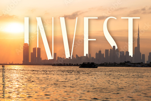 'Invest in Dubai' real estate concept wallpaper with Dubai skyline at sunset