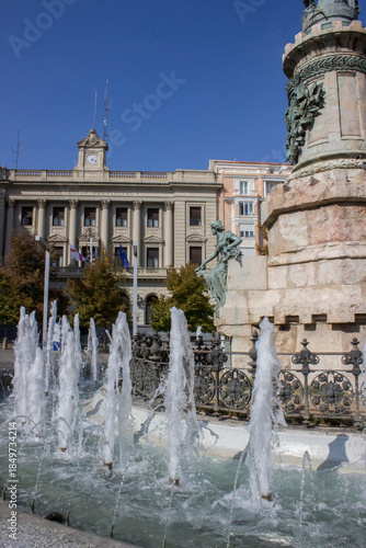A decorative fountain with sculptures in the city of Zaragoza