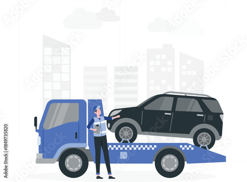 Tow truck driver standing beside vehicle on flatbed