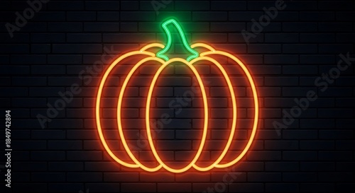 Orange and green neon pumpkin sign on dark brick wall neon sign Halloween