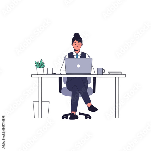Professional woman working diligently at her desk with a laptop and office supplies in a modern