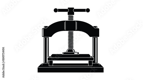Black silhouette of a bookbinding press machine on a isolated on white background