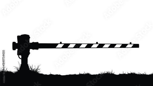 Black silhouette of a railroad crossing gate on a isolated on white background