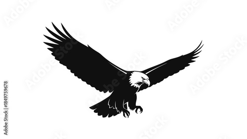 Black silhouette of a bald eagle in flight with outstretched wings isolated on white background