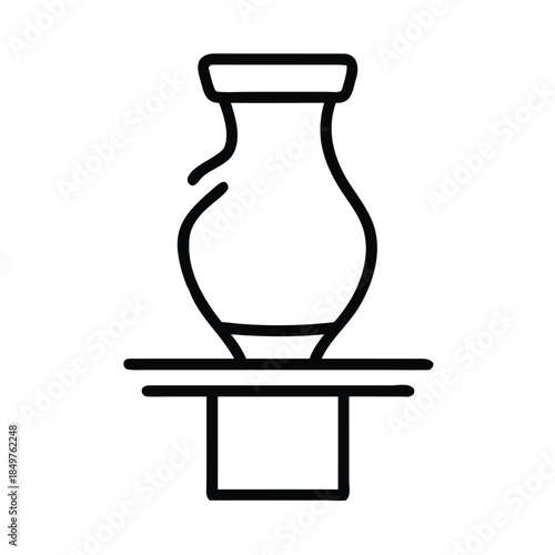 Simple black line art icon depicting an ancient amphora or vase resting upon a pedestal base